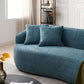 Modern curved boucle fabric 3 seat sofa in blue, featuring thickened seat and backrest for optimal relaxation in a sophisticated living room.