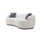 Modern Curved Boucle Fabric 3 Seat Sofa 86" in white with blue pillows, luxurious and comfortable with a sophisticated curved silhouette