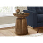 Hammered Metal Round Drum Accent End Table in a Living Room Setting.