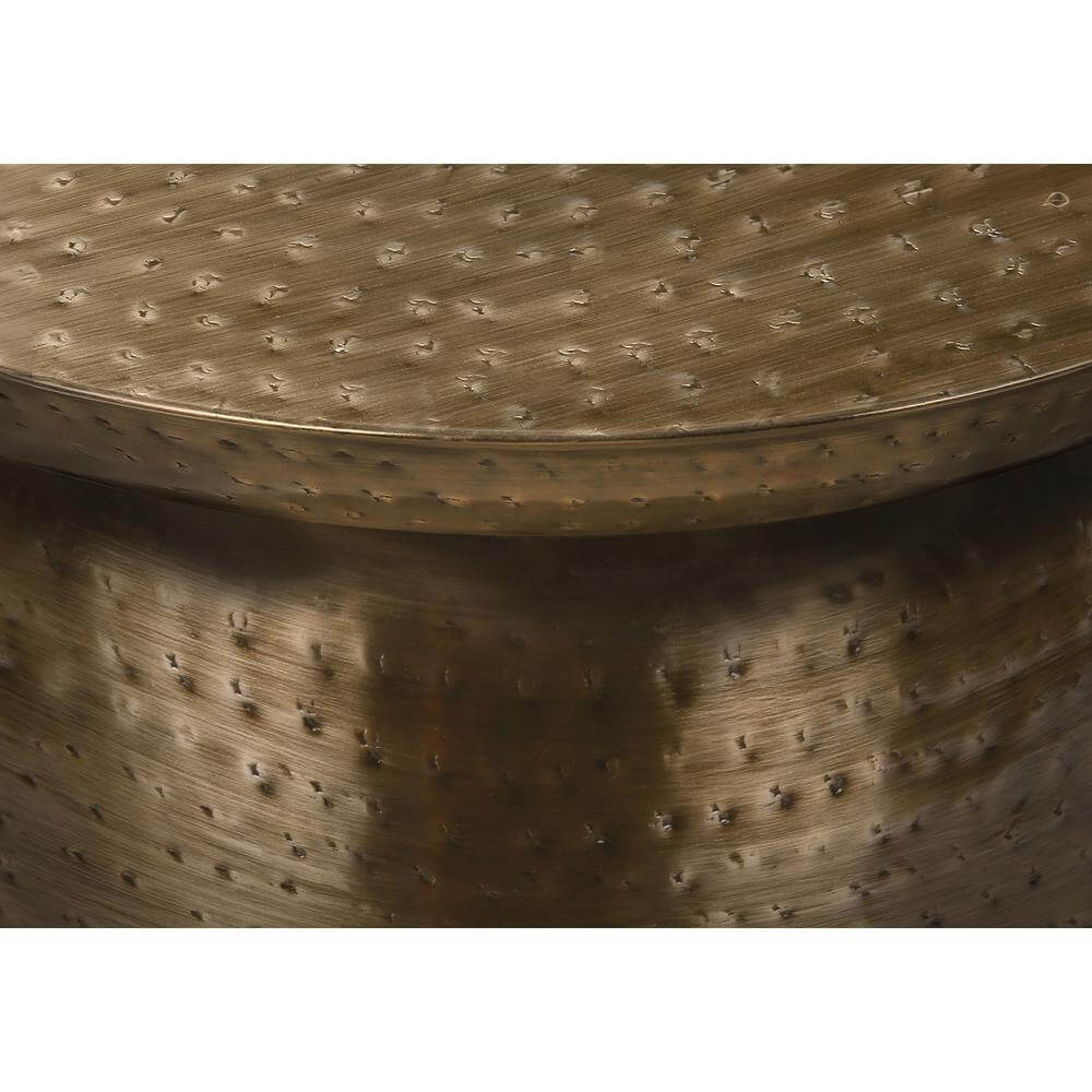 Close-up of Hammered Metal Round Drum Accent End Table showing textured gold finish