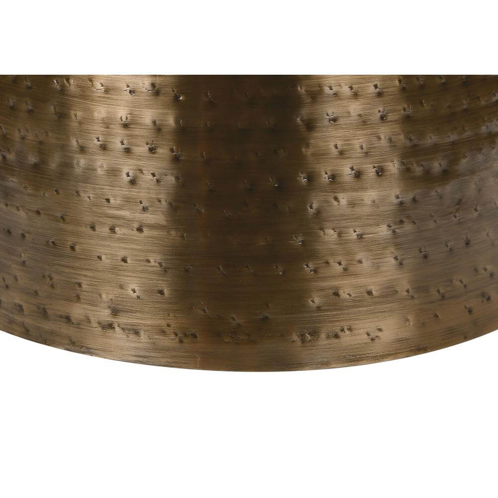 Close-up of hammered metal pattern on the round drum accent end table in gold finish