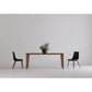 Loden Solid Wood Rectangular Dining Table 76" with Black Chairs in Minimalist Dining Room