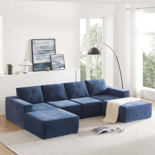 Modular U shape dual chaise chenille fabric sectional sofa 110" in blue, arranged in a living room with modern decor