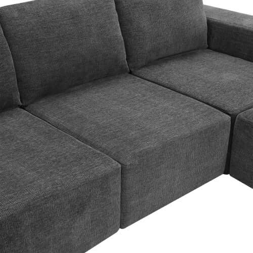 Close-up of a gray chenille fabric modular sectional sofa with dual chaise seats in a U shape design