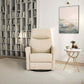 Ivory top grain leather Harlow swivel glider recliner chair in modern living room with bookshelf and side table.