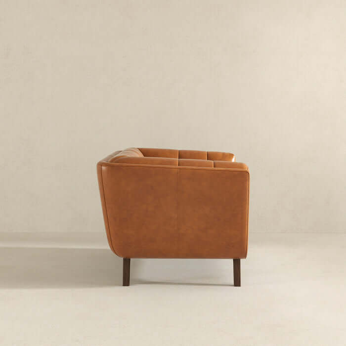 Side view of Addison MCM Styled Tufted Leather Lounge Chair showing clean mid-century modern lines and tufted details