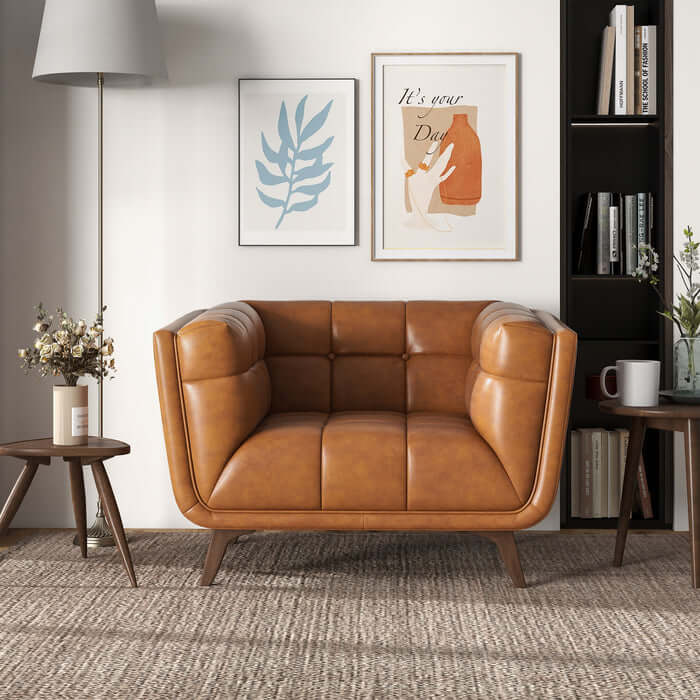 Addison MCM styled tufted leather lounge chair in a modern living room setting with mid-century modern decor.