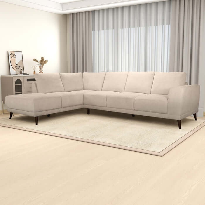 Amara MCM Left Facing Chaise Sectional Sofa in Cream 120-inch featuring mid-century modern design in a cozy, bright living room.