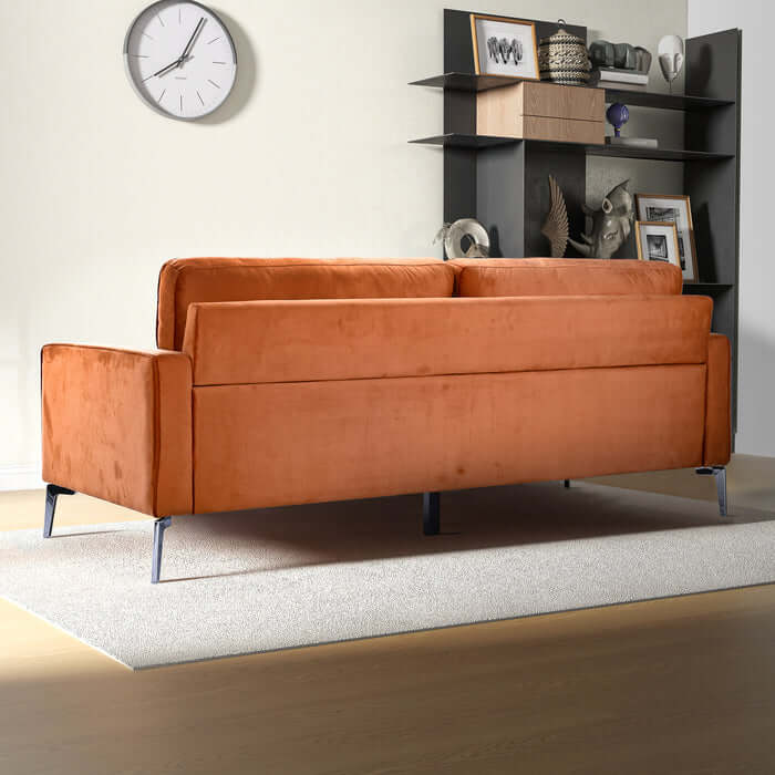 Back view of Axten MCM Orange Velvet Sofa 77" in modern living room with shelves and decor items