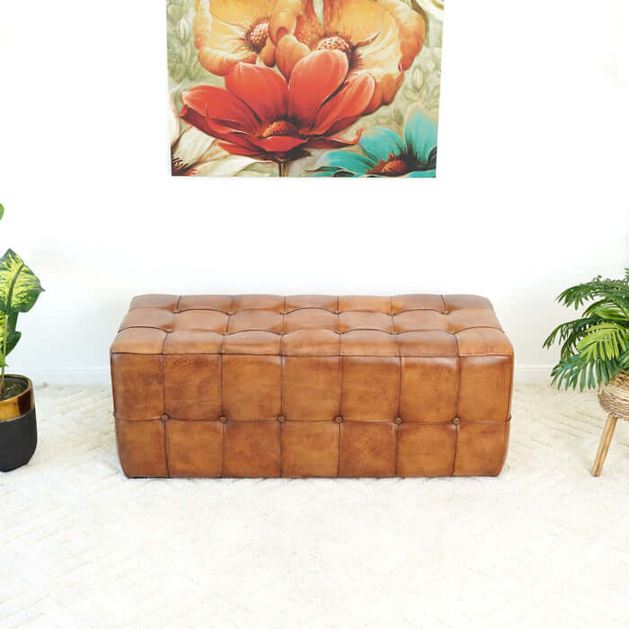 Benjiro Button Tufted Rectangular Leather Ottoman 47" in mid-century modern style with solid wood frame and luxurious leather upholstery in a living space.