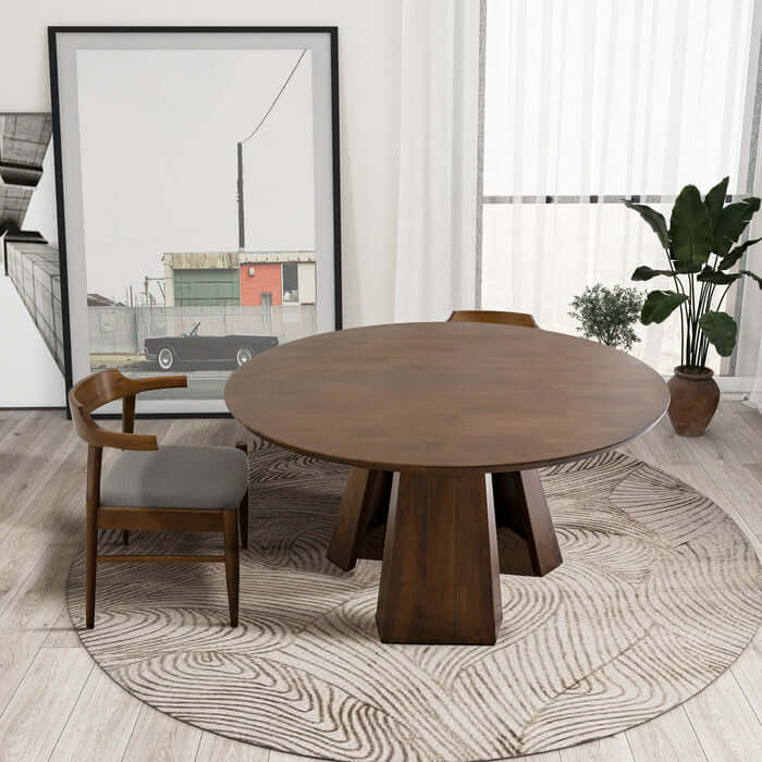 Bolton Round Walnut Wood Dining Table 53" with pedestal base and chairs, shown in a modern dining room with natural light.