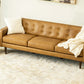 Braxton MCM Tan Genuine Leather Button Tufted Sofa (88") in a modern living room setting