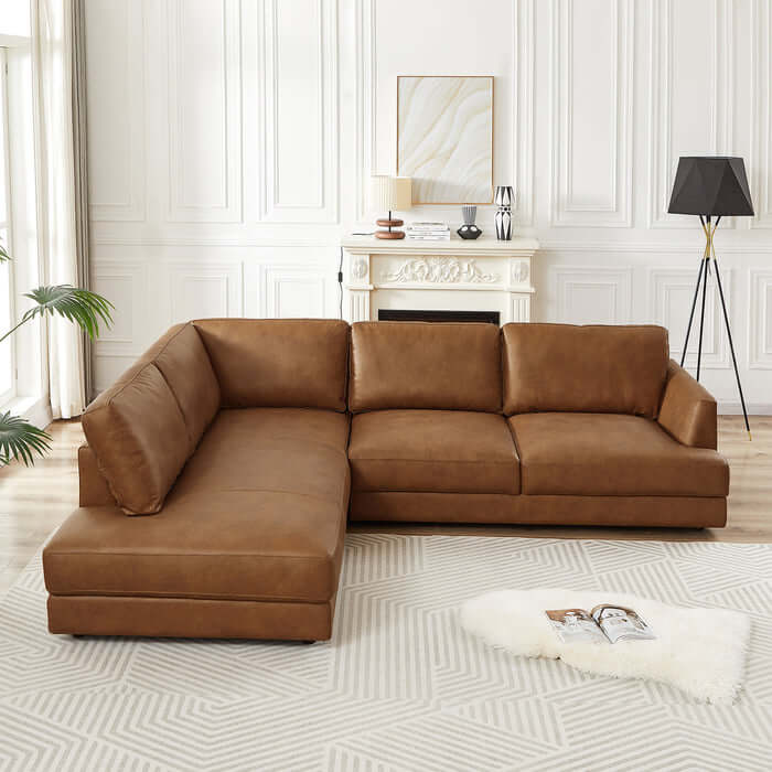 Glander Modern Leather Sectional Chaise Sofa 108" in stylish living space with fireplace and elegant decor.