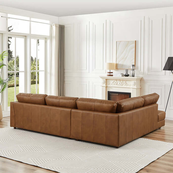 Glander Modern Leather Sectional Chaise Sofa 108" in elegant living room with fireplace and large windows