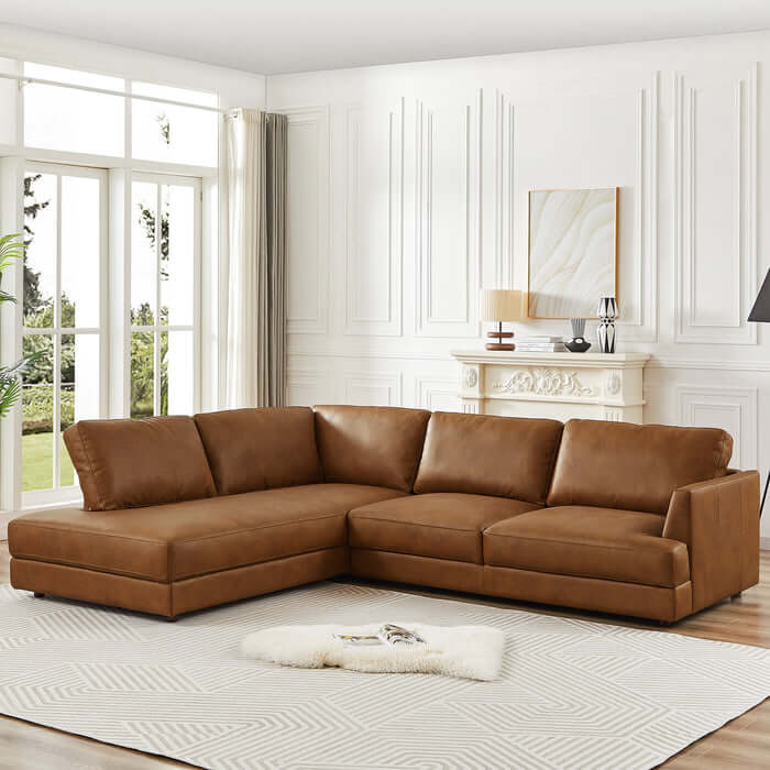 Glander Modern Leather Sectional Chaise Sofa 108" in a stylish living room setting with large windows and elegant decor.