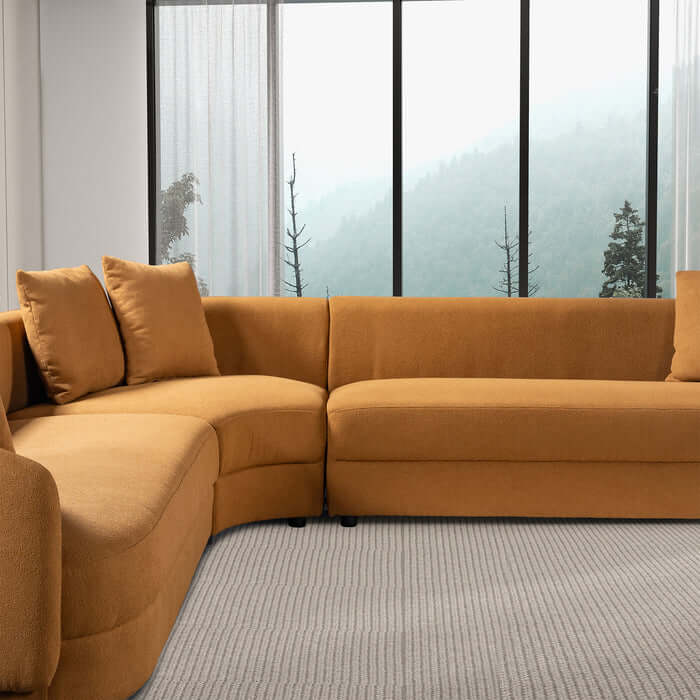 Highline Boucle Corner Sectional Sofa 122" in mustard color, featuring sleek spherical profile and plush wool-like boucle fabric upholstery.