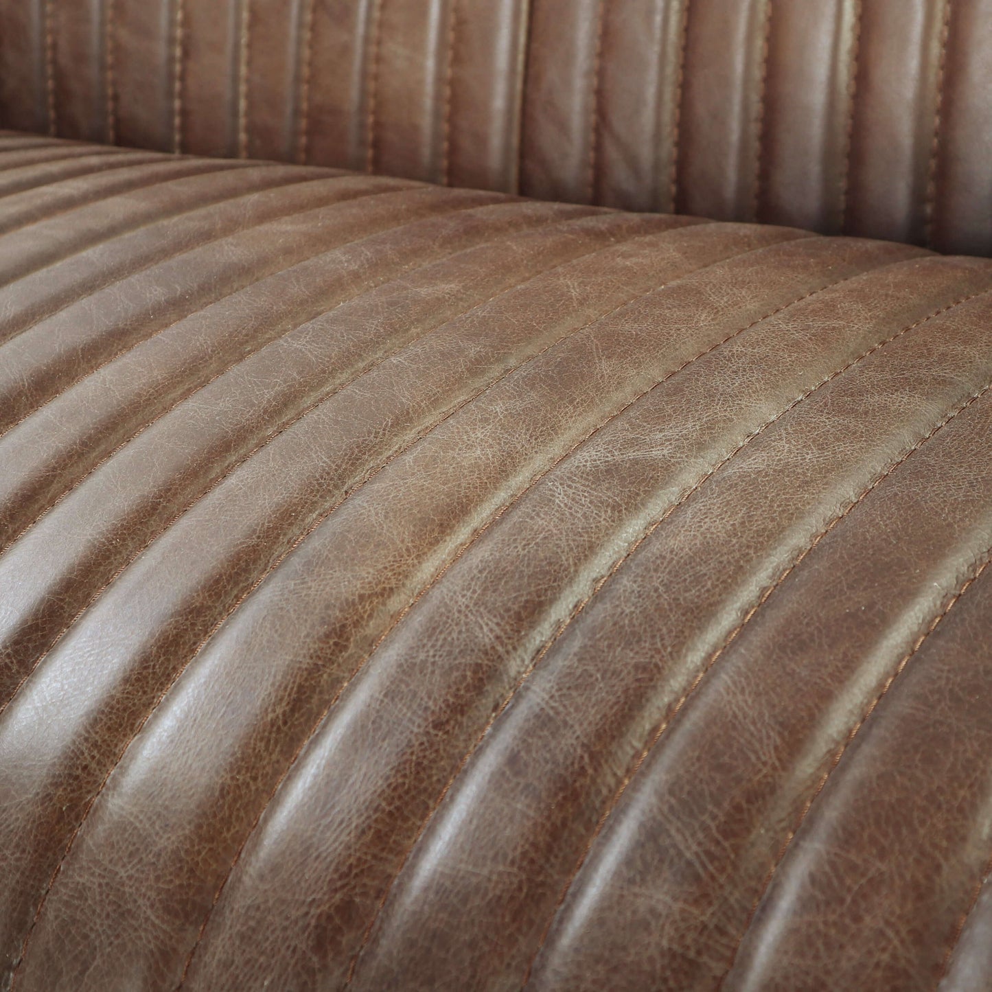 Brancaster Retro Inspired Lounge Chair in Brown Top Grain Leather & Aluminum - Revel Sofa 