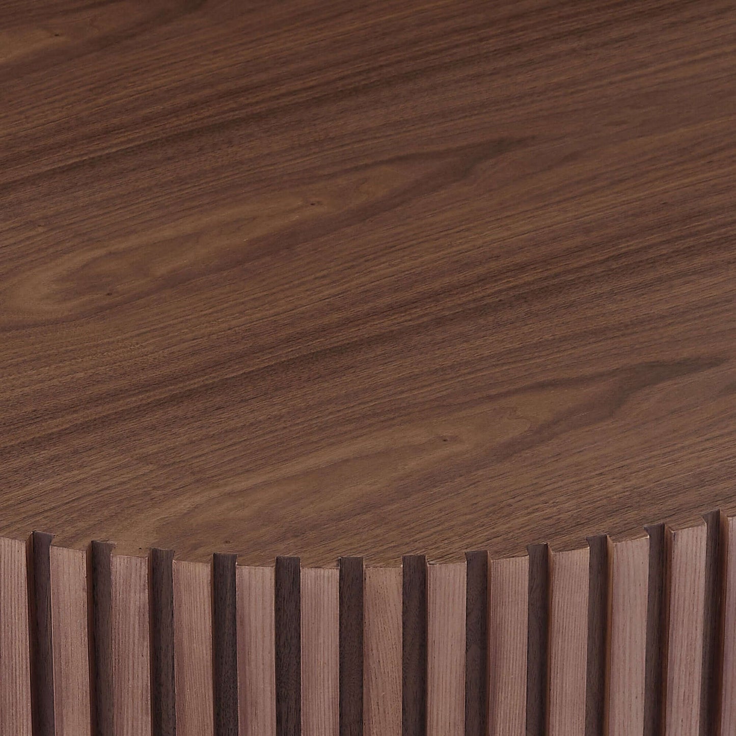 Close-up of the round MDF wood coffee table's textured surface and sturdy pedestal base design.